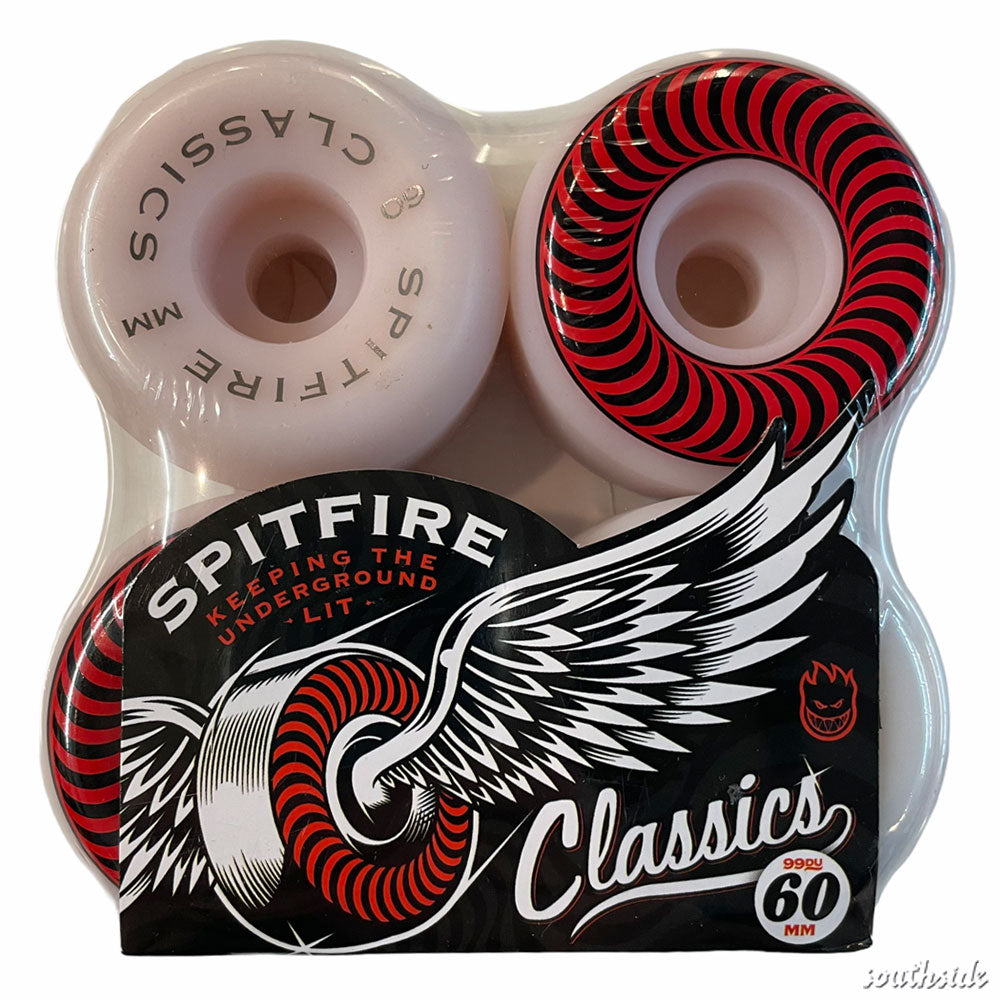 A four-pack of Spitfire Wheels Classic 60mm99A, white wheels with red and black spiral design, packaged in clear plastic showing the Spitfire logo and wings on the front.