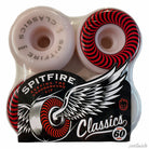 A four-pack of Spitfire Wheels Classic 60mm99A, white wheels with red and black spiral design, packaged in clear plastic showing the Spitfire logo and wings on the front.